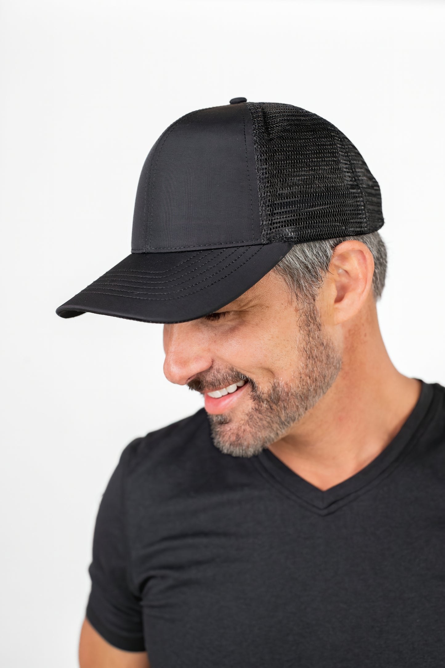 Black Waterproof Snapback Trucker Hat